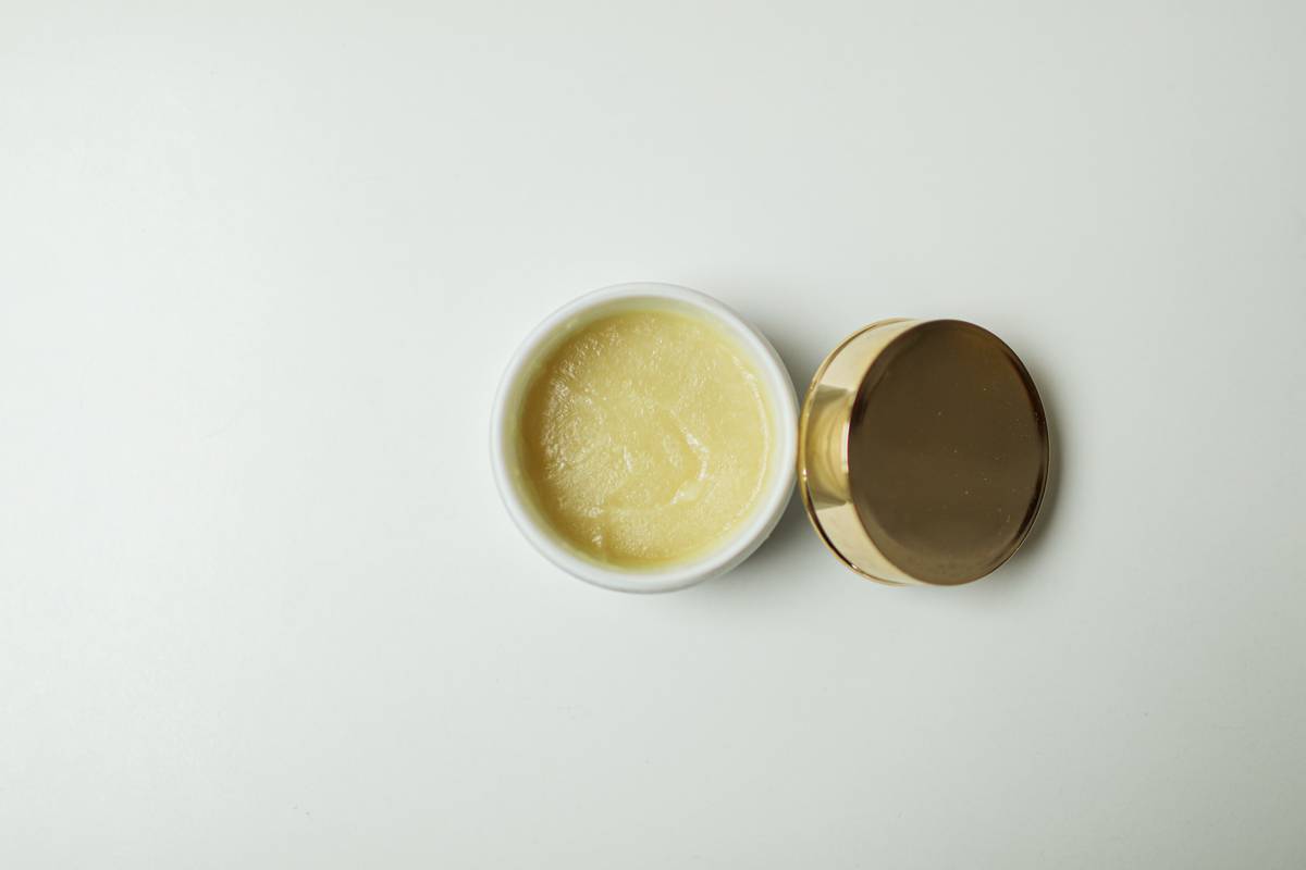 Close-up of strong hold pomade texture in jar with matte finish